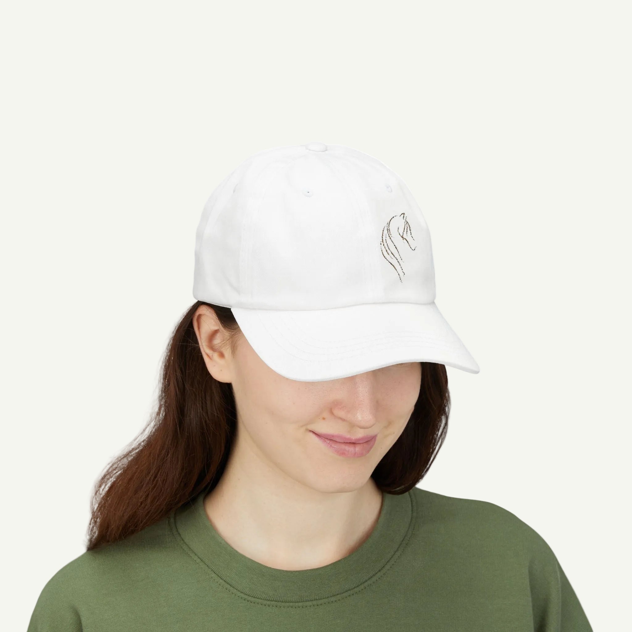 Person wearing a white cap with a logo on a white background