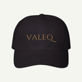 Black cap with 'VALEQ' logo on a white background