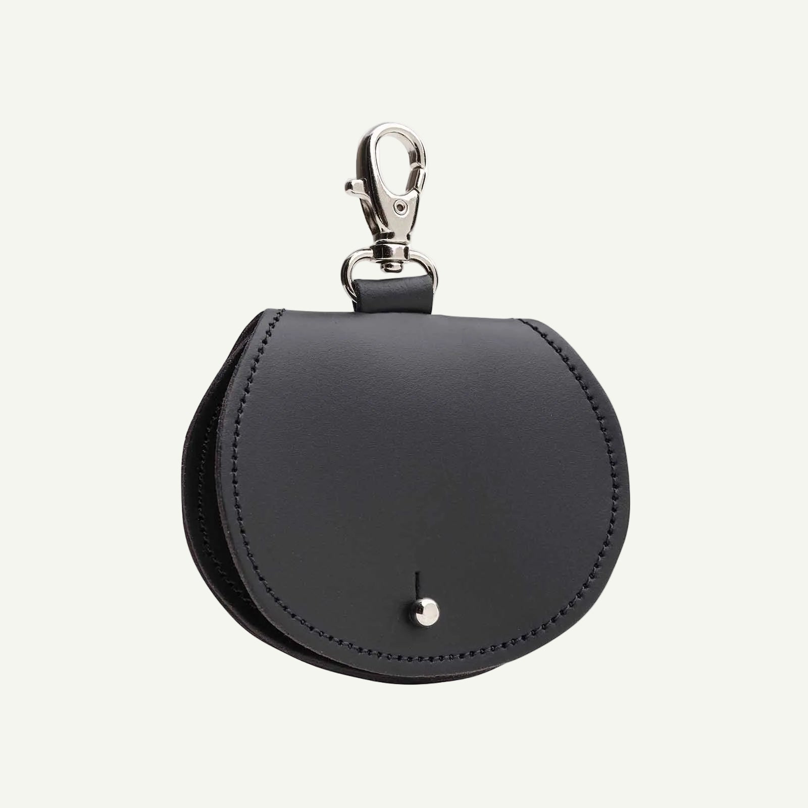 Black leather keychain pouch with metal clasp on a white background
