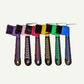 Set of colorful hairbrushes on a white background
