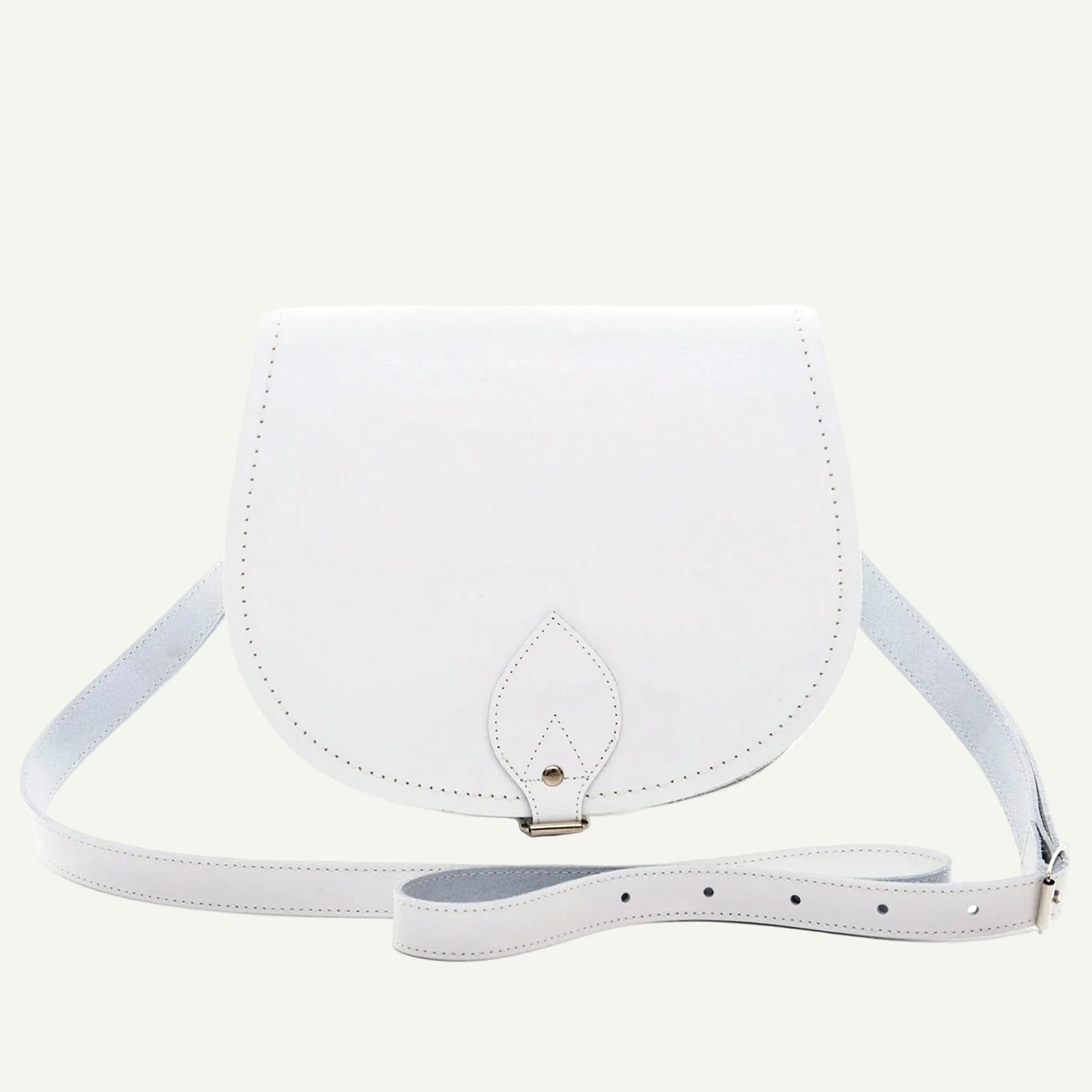 White leather crossbody bag on a white background